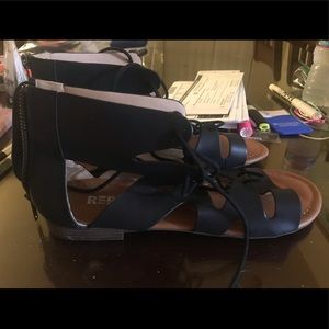 Report Black leather gladiator sandals